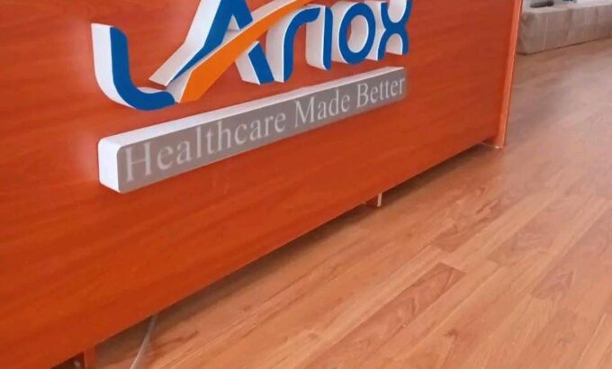 Modern reception sign designed and installed by Danix Signs Limited, featuring custom office signage for a professional workspace.