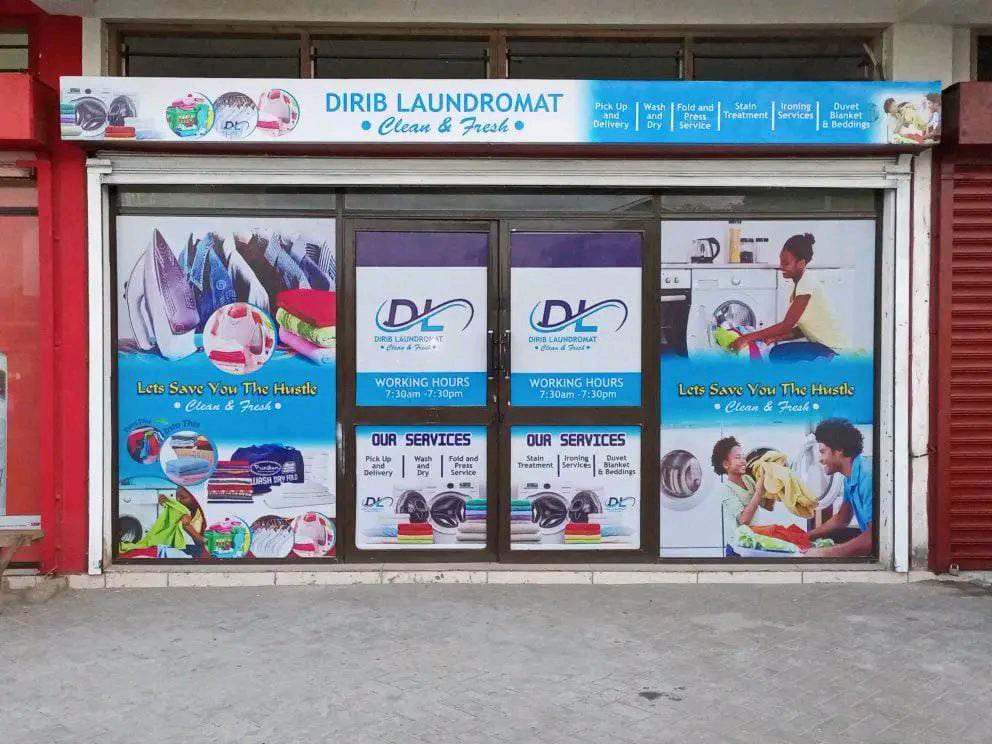 Corporate window, door, wall branding sign with company logo graphics designed and installed by Danix Signs Limited in Nairobi