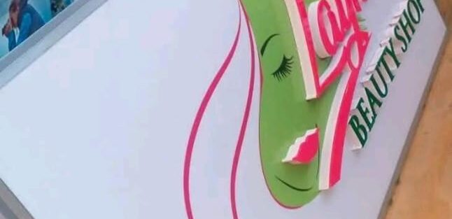 Professional beauty salon signboard in Nairobi Kenya with illuminated signage design.