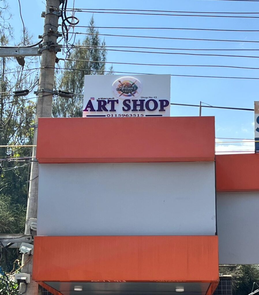 Custom outdoor shop sign installed in Nairobi by Danix Signs Limited for business visibility.