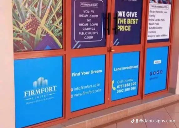 Custom window branding in Kenya showing vinyl graphics and logo design on office glass