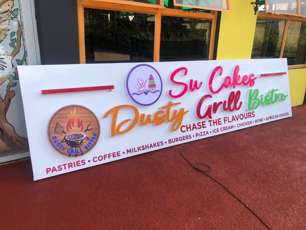 Signage arcade installation in Nairobi by Danix Signs Limited featuring modern LED shopfront signs on a commercial building